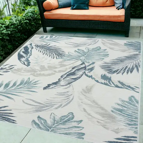 Blue and Serene White Palm Leaf Stain Resistant Indoor Outdoor Area Rug Photo 1