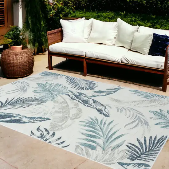 Blue and Serene White Palm Leaf Stain Resistant Indoor Outdoor Area Rug Photo 1