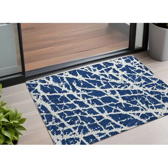 Navy and Ivory Abstract Washable Non Skid Indoor Outdoor Area Rug Photo 1