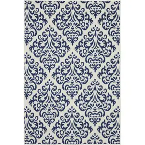 Photo of Blue and White Damask Power Loom Area Rug