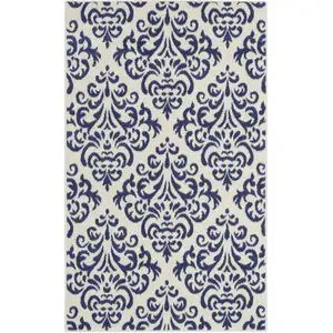 Photo of Blue and White Damask Power Loom Area Rug