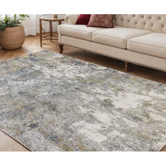 Ivory Blue and Yellow Abstract Power Loom Area Rug Photo 1