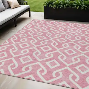 Photo of Blush And Ivory Geometric Washable Indoor Outdoor Area Rug