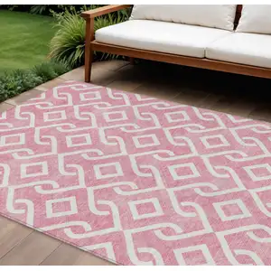 Photo of Blush And Ivory Geometric Washable Indoor Outdoor Area Rug