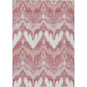 Photo of Blush Mauve And Ivory Ikat Washable Indoor Outdoor Area Rug