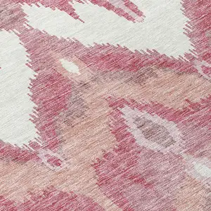 Photo of Blush Mauve And Ivory Ikat Washable Indoor Outdoor Area Rug