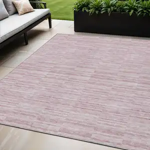 Photo of Blush Pink And Beige Striped Washable Indoor Outdoor Area Rug