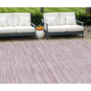 Photo of Blush Pink And Beige Striped Washable Indoor Outdoor Area Rug