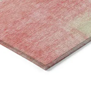 Photo of Blush Pink And Ivory Abstract Washable Indoor Outdoor Area Rug