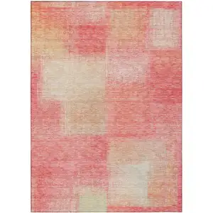 Photo of Blush Pink And Ivory Abstract Washable Indoor Outdoor Area Rug