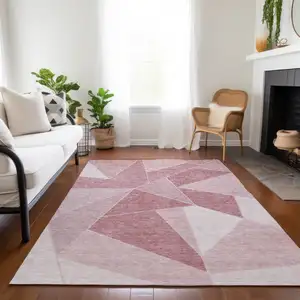 Photo of Blush Pink And Ivory Geometric Washable Indoor Outdoor Area Rug