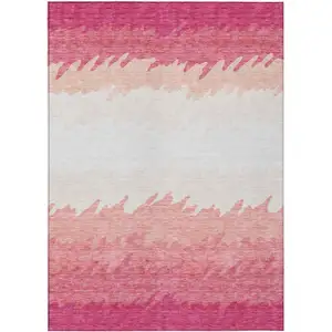 Photo of Blush Pink And Ivory Striped Washable Indoor Outdoor Area Rug