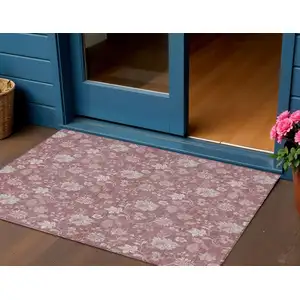 Photo of Blush Pink And Mauve Floral Washable Indoor Outdoor Area Rug