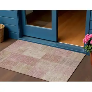 Photo of Blush Pink And Mauve Patchwork Washable Indoor Outdoor Area Rug