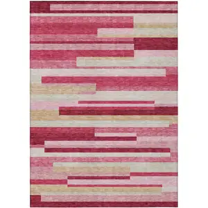 Photo of Blush Pink And Mauve Striped Washable Indoor Outdoor Area Rug