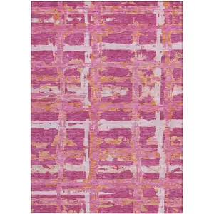 Photo of Blush Pink And Orange Striped Washable Indoor Outdoor Area Rug