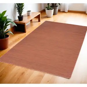 Photo of Brick Red Abstract Washable Area Rug