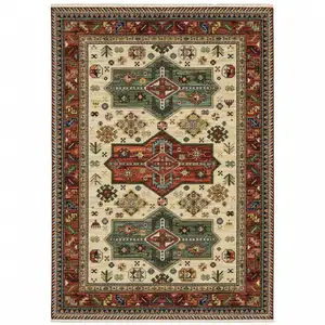 Photo of Brick Red Orange Rust Beige Gold Pale Blue Olive Navy And Black Oriental Power Loom Stain Resistant Area Rug With Fringe