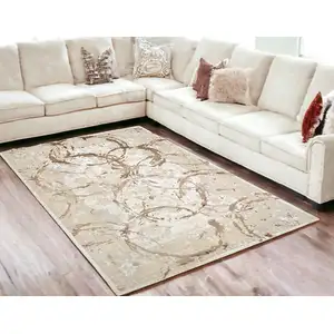 Photo of Bronze Abstract Area Rug With Fringe