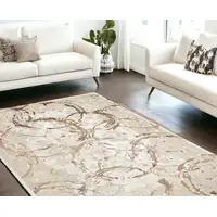 Photo of Bronze Abstract Area Rug With Fringe
