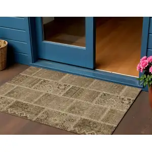 Photo of Brown And Beige Patchwork Washable Indoor Outdoor Area Rug