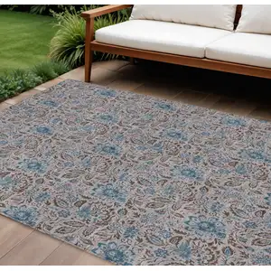 Photo of Brown And Blue Floral Washable Indoor Outdoor Area Rug