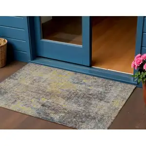 Photo of Brown And Gold Abstract Washable Indoor Outdoor Area Rug