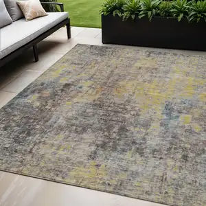 Photo of Brown And Gold Abstract Washable Indoor Outdoor Area Rug