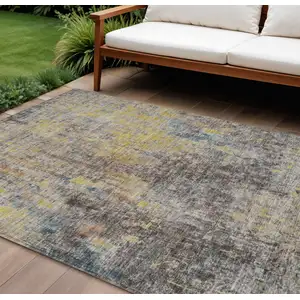 Photo of Brown And Gold Abstract Washable Indoor Outdoor Area Rug