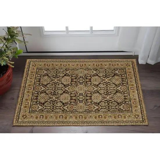 Brown And Gold Oriental Area Rug Photo 1