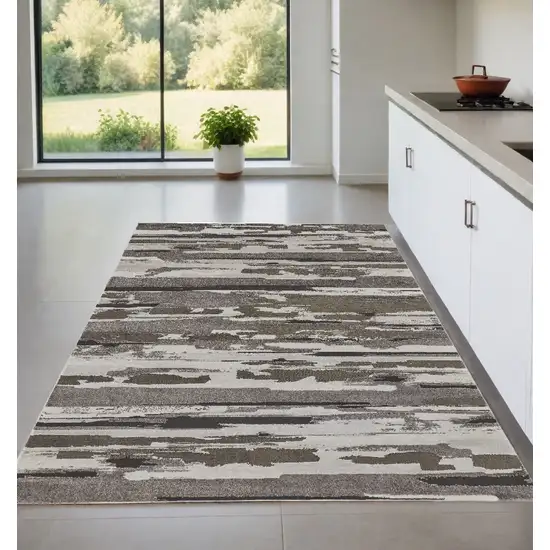 Gray and Ivory Abstract Power Loom Distressed Area Rug Photo 1