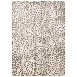 Photo of Brown And Ivory Abstract Stain Resistant Area Rug