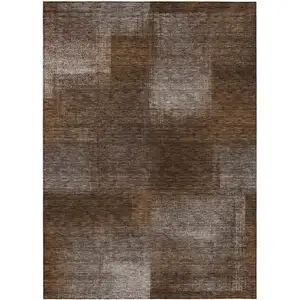 Photo of Brown And Ivory Abstract Washable Indoor Outdoor Area Rug