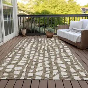 Photo of Brown And Ivory Abstract Washable Indoor Outdoor Area Rug