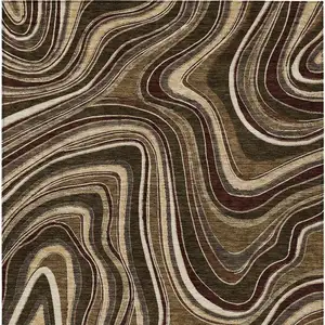 Photo of Brown And Ivory Abstract Washable Indoor Outdoor Area Rug