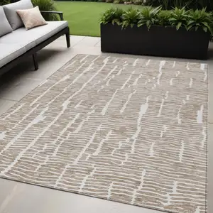 Photo of Brown And Ivory Abstract Washable Indoor Outdoor Area Rug