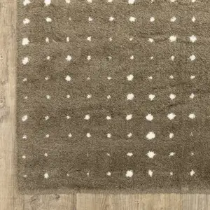 Photo of Brown And Ivory Geometric Area Rug