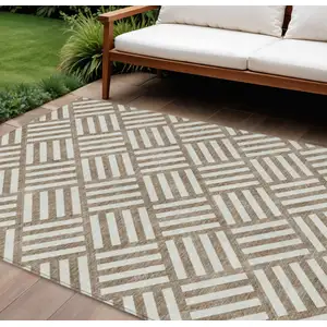 Photo of Brown And Ivory Geometric Washable Indoor Outdoor Area Rug