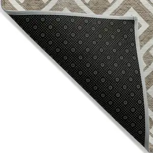 Photo of Brown And Ivory Geometric Washable Indoor Outdoor Area Rug