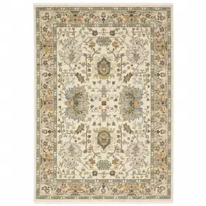 Photo of Brown And Ivory Oriental Power Loom Area Rug With Fringe