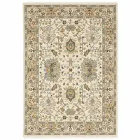 Photo of Brown And Ivory Oriental Power Loom Stain Resistant Area Rug With Fringe