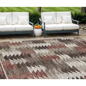 Photo of Brown And Ivory Southwestern Washable Indoor Outdoor Area Rug