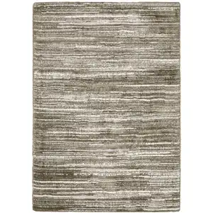 Photo of Brown And Ivory Striped Distressed Area Rug