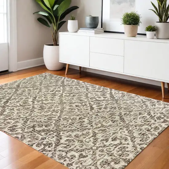 Brown And Ivory Wool Floral Hand Tufted Area Rug Photo 1