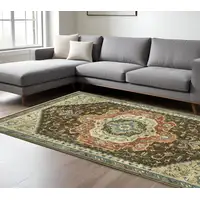 Photo of Brown And Orange Oriental Area Rug With Fringe