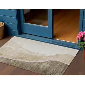 Photo of Brown And Taupe Abstract Washable Indoor Outdoor Area Rug