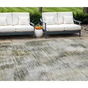 Photo of Brown And Taupe Abstract Washable Indoor Outdoor Area Rug