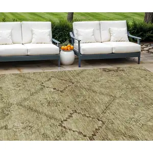 Photo of Brown Beige And Artichoke Green Floral Washable Indoor Outdoor Area Rug