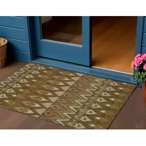 Photo of Brown Beige And Artichoke Green Southwestern Washable Indoor Outdoor Area Rug