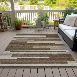 Photo of Brown Beige And Copper Striped Washable Indoor Outdoor Area Rug